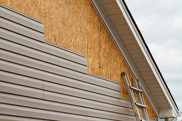 Professional Siding Replacement technician working in Englewood, NJ